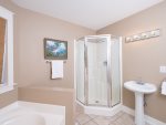 Bathroom 1:  Water closet, step in shower and separate vanities